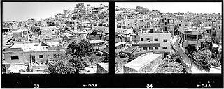 The Dheisheh refugee camp, Bethlehem, 2001 -- one of 59 such temporary living areas established for Palestinian refugees by the United Nations in 1949. Dheisheh currently has 10,000 residents, technically under the jurisdiction of the Palestinian Authority, with services provided by the U.N.