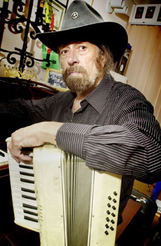 Augie Meyers today, as well known for his accordion playing as for his famous Vox Continental