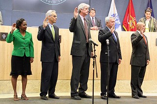 Mayor Lee Leffingwell (second from right) is sworn in with new and returning council members.