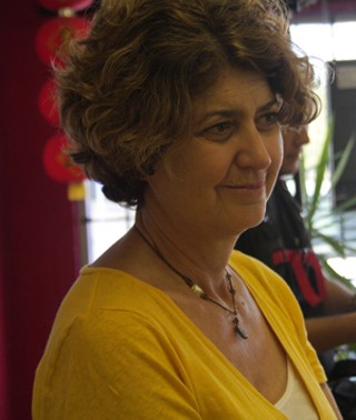 Filmmaker Nancy Schiesari on location at River City Tattoo in Killeen, Texas