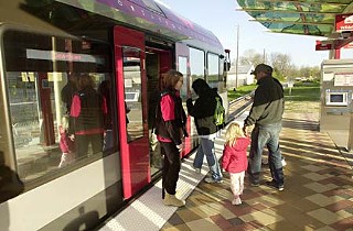 Passengers board Capital Metro’s Red Line, which made its debut Monday. See “<b><a href=http://www.austinchronicle.com/gyrobase/Issue/story?oid=oid%3A985788>You’ve Got Rail!</a></b>”