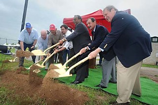Travis County Commissioner Ron Davis, third from right, leads Wednesday's groundbreaking for a 52-mile water supply pipeline that will serve eastern Travis County, which includes Davis' Precinct 1, and parts of neighboring counties. The Cross County Water Supply Corp. will provide the water, which is pumped from the Simsboro Aquifer in Burleson County. The pipeline is needed, Davis says, to meet water demands as Austin grows eastward, although some environmentalists aren't keen on the county's participation in a project that involves tapping into a distant groundwater source.