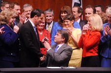 Perry Signs HB 2