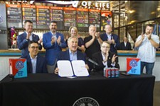 Greg Abbott Signs "Beer-to-Go" Bill at Austin Beerworks