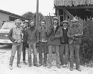On the set of <i>The Whole Shootin' Match</i> (l-r): art director Jim Rexrode, actor Sonny Davis and his dog, soundman Wayne Bell, an unidentified extra, director Eagle Pennell, assistant director Doug Holloway, and actor Lou Perryman