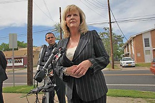 Dallas City Manager Mary Suhm talked to the press last week, outside the offices of the Austin NAACP, about her city's search for a new police chief. Austin Police Chief Art Acevedo (l) is one of six finalists for the job.