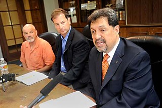 Three of a kind: (l-r): KUT's Hawk Mendenhall and Stewart Vanderwilt and UT Vice President for Student Affairs Juan González on Wednesday