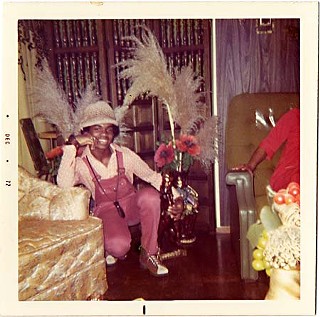 Love at 13, wearing a pink, Jacksons-style jumpsuit