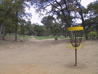 A city report points to trampling and soil compaction in the area surrounding this disc golf basket at Pease Park.