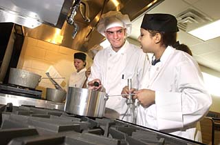 (l-r): Alecia Silva (background), Bryan Reeder, and Maria Briones