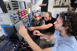 Jeannot Quenson (l) and Dann Green at Handmade Music Austin's Summer Swap Party at Salvage Vanguard Theater