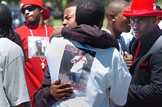 Mourners at Nate Sanders' funeral