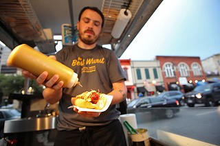 Isaac serves it up at Best Wurst.