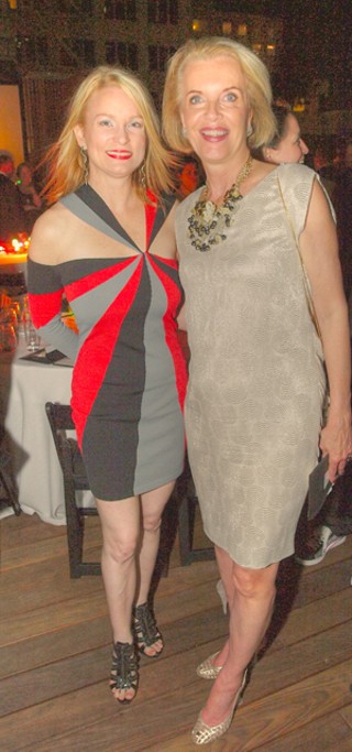 Anne Elizabeth Wynn (l) and Becky Beaver enjoy the new rooftop at the gorgeously renovated Arthouse.
