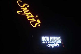 Sugar's Uptown Cabaret in Central Austin is one of two clubs named in a wage lawsuit.