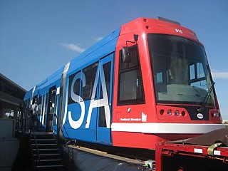 Just imagine Austin with urban rail, like Portland's spiffy 66-footer that made a brief stop at the Palmer Events Center on Monday. What a tease! The rail car's appearance here also served as a vehicle for city officials to begin crafting a rail campaign message to take to voters in 2012.
