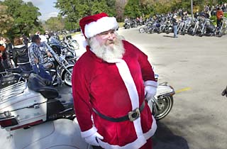 On Sunday, Santa drove a hog instead of reindeer. The 10th Annual Big Dave's Toy Run featured hundreds of bikers riding their motorcycles from Big Dave's Dam Saloon Smokehouse & Grill in Lakeway to downtown Austin to deliver toys to residents of the Austin Children's Shelter. The shelter provides emergency housing and care to 300 abandoned, abused, and neglected children every year.