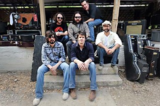 Enlightened Rogues: (clockwise from top) John Chipman, Colin Brooks, Gordy Quist, Ed Jurdi, Trevor Nealon, and Seth Whitney, backstage
at Old Settler's Music Festival, April 17