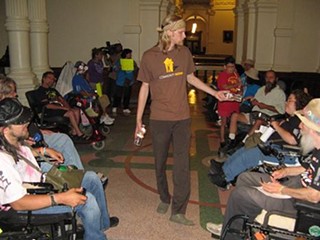 ADAPT Texas protesters outside of last night's education budget debate. While school finance dominates the debate, House Public Education Chair Rob Eissler calls Health and Human Services 