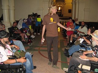 ADAPT Texas protesters outside of last night's education budget debate. While school finance dominates the debate, House Public Education Chair Rob Eissler calls Health and Human Services