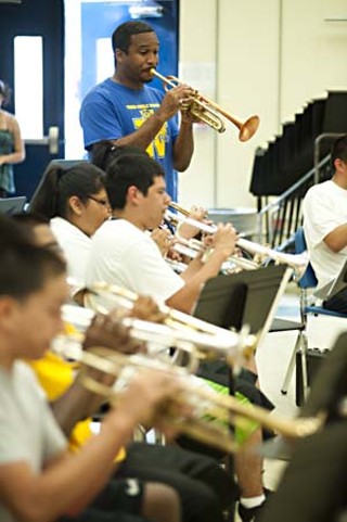 Ormide Armstrong leads the trumpet section.