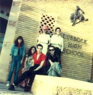 Jones and Strummer (front center) at Buddy Holly High.