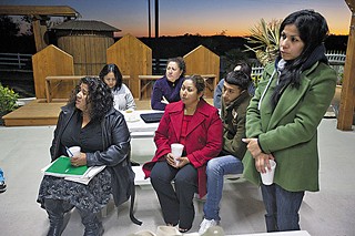 Las Lomitas residents, including NA Treasurer-Elect Mary Escalante (far left) and President-Elect Maria Avila (far right), met last week to discuss the community's water problems.