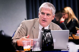 Robert Schneider opposes the charter plan.