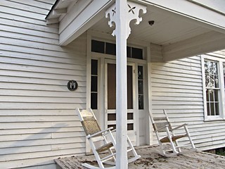 The front porch and Austin Landmark plaque