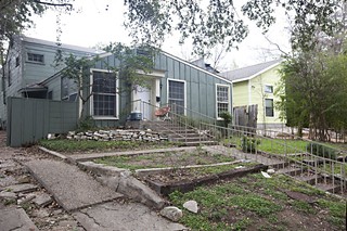 Plans to rebuild this West Campus home as a duplex has neighbors worried it will become a student rooming house.