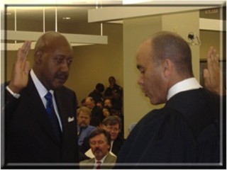 Judge Sturns being sworn in by Chief Justice Jefferson