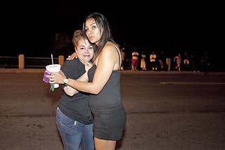 Friends, family, and neighbors react at the scene of last week's police shooting of Ahmede Jabbar Bradley.