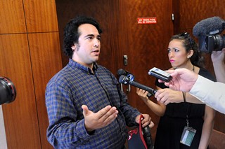 Occupy defendant Ronnie Garza speaks to media outside a Houston courtroom in September.