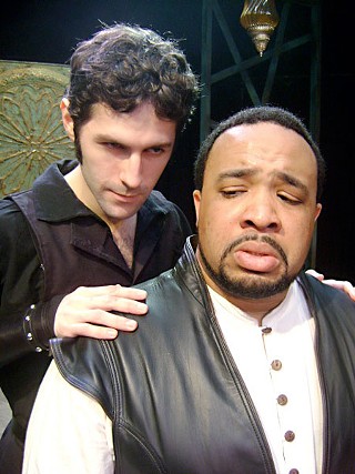 I'll pour this pestilence into his ear: Iago (Andrew Bosworth) works on Othello (Trevor Bissell)