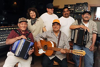 Family portrait: Chencho Flores, Clemencia Zapata, Bradley Jaye Williams, Vicente Alonzo, Javier Cruz, and Isidro Samilpa