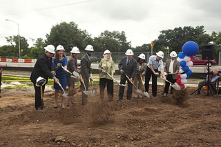 This may look like any other groundbreaking ceremony but last week's dirt-turning event marked the long-awaited start on construction of the city's new Central Library at 710 W. Cesar Chavez. Voters approved the $120 million project in 2006. Library director Brenda Branch, center,
is joined by Mayor Lee Leffingwell, City Council members and other city officials at the March 30 event.