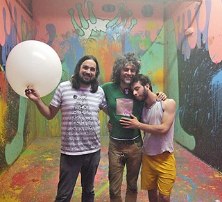 Group hug: (l-r) Zac Traeger, Wayne Coyne, and Shmu