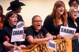 Yatzel Sabat (c) and other protesters outside the HB 2 signing ceremony on July 18, 2013