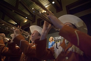 Wendy Davis watches from the stage as the UT marching band sounds the last notes of the Texas Tribune Festival, which ended Sept. 29.