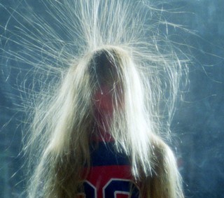 Cousin It quickly realized he shouldn't have taken his Tesla coil into the photo booth: Madness in Drafthouse Films brain shredder The Visitor