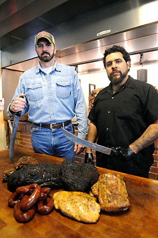 Chad Franks (l) and Bryan Garcia of Schmidt Family Barbecue