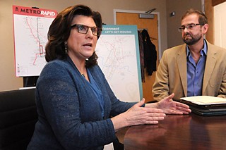 Cap Metro president and CEO Linda Watson defines MetroRapid as somewhere between bus and rail.