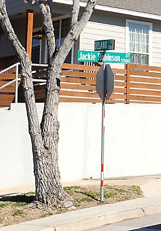 Few of Jackie Robinson's footprints remain from the half-year that he lived in Austin. But his name lives on within the Lincoln Gardens neighborhood. From Springdale Road and Givens Park, drive east on Webberville for half a mile, and take a right onto Delano Street. There, about 1,500 feet south and to the left, you'll see a green sign designating Jackie Robinson Street.