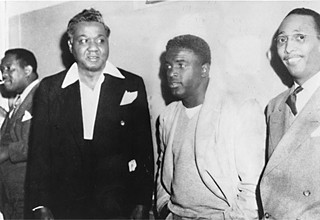 (l-r) Kenneth Lankins, Dr. E.H. Givens, Jackie Robinson, and the Rev. Karl Downs; date unknown
