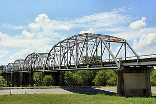 The historic trestle crossing the Colorado River is just one cool thing about Montopolis.