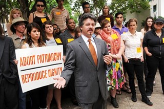 Attorney Paul Quinzi speaks during a Rise Up Texas press conference April 21