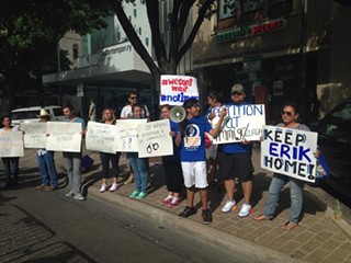 Protesters call on President Obama to halt deportations.