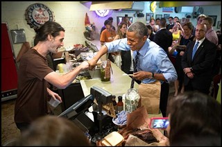 OK, OK, he didn't have to wait in line, but he paid for everyone after fist-bumping this dude.