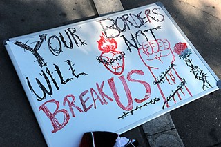 Immigrant rights' supporters respond to an anti-immigration protest in Austin last week.
For more, see the Battle of the Bullhorns at Newsdesk<b> </b>Aug. 8.