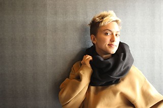 Ruby Willmann scales up the style in a voluminous sweatshirt and scarf by Acne Studios (courtesy of Kick Pleat).